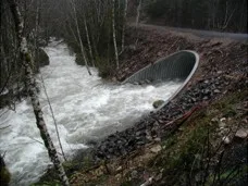 Deep corrugated structural plate stream crossing culvert installation