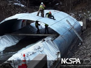 long span steel structural plate low profile arch bridge replacement