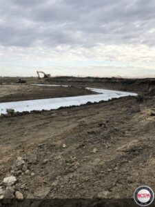 drainage basin bypass pipe diversion levee