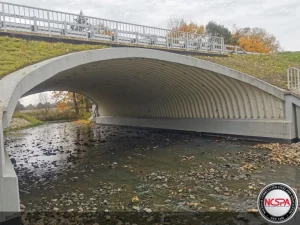 Completed structural plate bridge spanning the Chudowski Stream in Poland.
